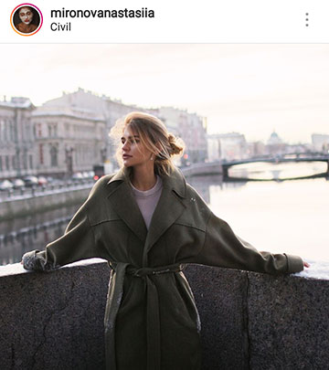 أفكار صور الخريف للإينستاجرام - فتاة على جسر في معطف